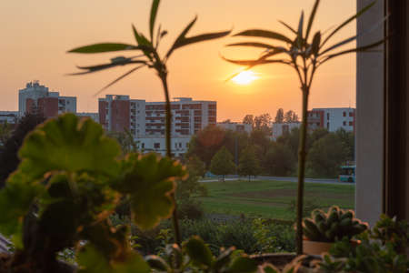 Sunset view from the window in an Italian town. Time Lapse Videoの写真素材