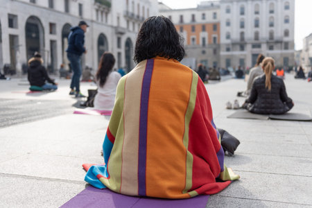 Yoga teachers protesting against the blockade and restrictions of Covid-19 in a square in Brescia,...