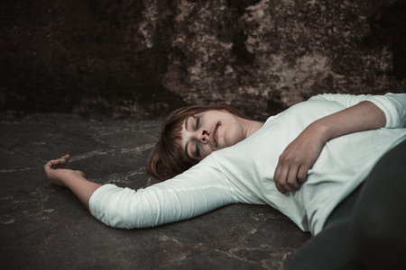 collapsed wounded girl