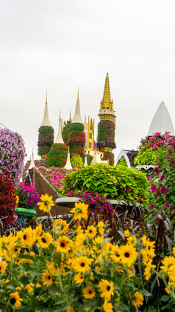 Fairy tale princess castle made of fresh petunia flowers in miracle garden in Dubai, United Arab Emirates. Vertical image.の写真素材
