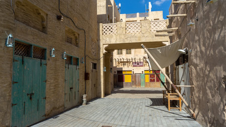 Street of Dubai old city or town or old village Al Seef Khor in Al Fahidi neighborhood, United Arab Emirates.の写真素材