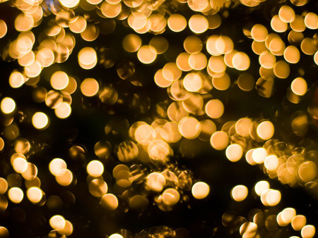 Bright golden christmas lights as a background