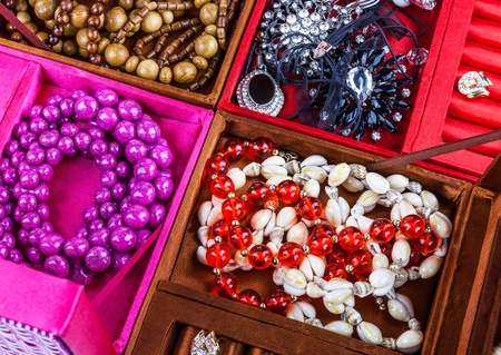 Boxes of different colors with lots of  jewelryの写真素材
