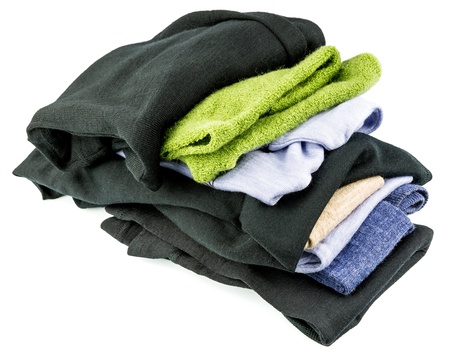Stack of woolen clothes isolated on white backgroundの写真素材