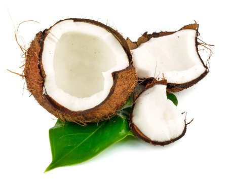 Coconut with green leaf isolated on white の写真素材