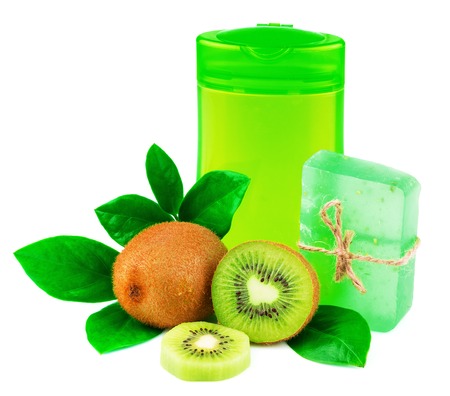 Shower products with fruit and green leaves isolated on whiteの写真素材