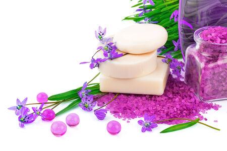 Spring concept with white soap, violet sea salt and purple snowdropsの写真素材