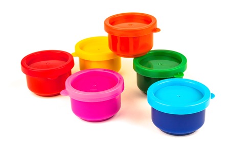 Paint cans of bright colors isolated on white backgroundの写真素材