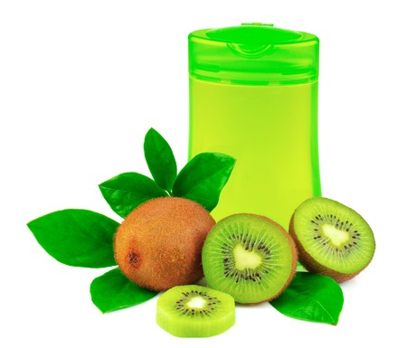 Shower product with fruit and green leaves isolated on white backgroundの写真素材