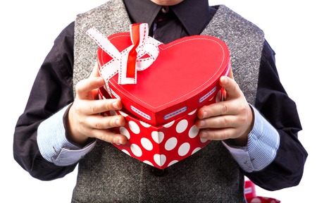 Macro view of gift box in man's handsの写真素材
