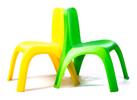 Green and yellow chairs isolated on white backgroundの写真素材