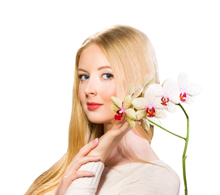 Girl portrait with flower isolated on white backgroundの写真素材