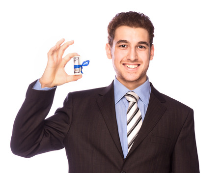 Happy man with money isolated on white backgroundの写真素材