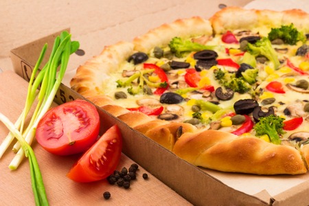 Macro view of tasty pizza with ingredientsの写真素材