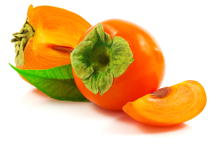 Macro view of ripe persimmon with green leaf isolated on white backgroundの写真素材