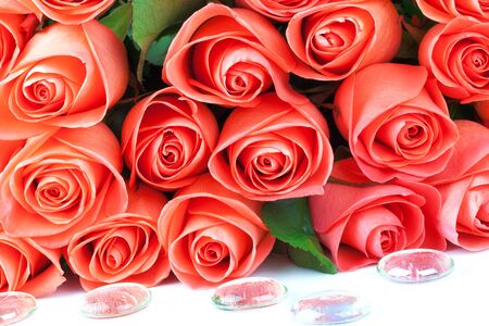 Bouquet of pink roses with drops isolated on white backgroundの写真素材