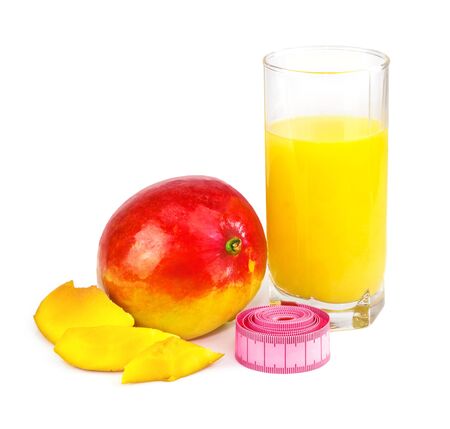 Mango juice in glass, mango fruit with centimeter isolated on white backgroundの写真素材