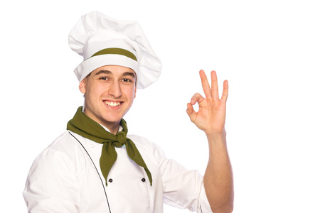 Portrait of smiling cook chef isolated on white backgroundの写真素材