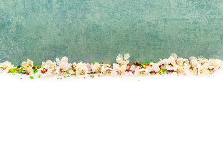 Abstract spring border background with blossom and candiesの写真素材