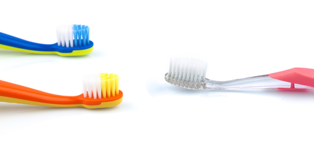 Color toothbrushes isolated on white backgroundの写真素材