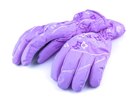 Violet sport gloves isolated on white backgroundの写真素材