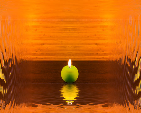 Abstract concept with candle and reflectionの写真素材