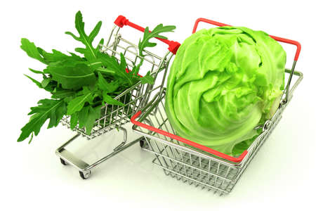 Cabbage and arugula in metal containers isolated on white backgroundの写真素材