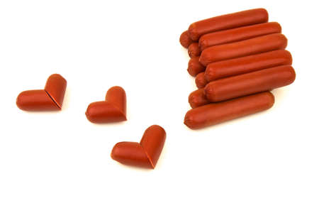 Favorite brown tasty sausages with cutting slices isolated on white backgroundの写真素材