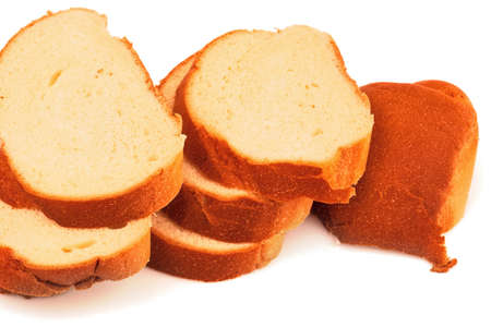 Macro view of slices of fresh white bread, loaf, baguette, brioche on white backgroundの写真素材