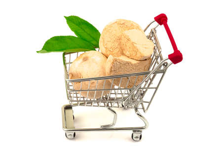 Group of homemade natural apple three marshmallows with green leaves in metal trolley cart. Isolated on white background.の写真素材