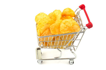 Heap, group of tasty crisp potato chips, snack in metal trolley, cart isolated on white backgroundの写真素材