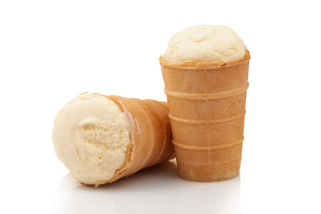 Two tasty milky ice cream in crisp waffle isolated on white backgroundの写真素材