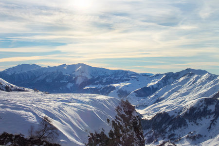 View of the snowy mountain range, Georgia. landscape. High mountains under snow on a sunny day....