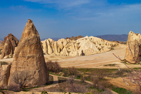 Beautiful fabulous landscape, bizarre mountains. Sandstone formations. Unusual mountains, stone volcanic formations. Strange and amazing views. Cappadocia,の写真素材