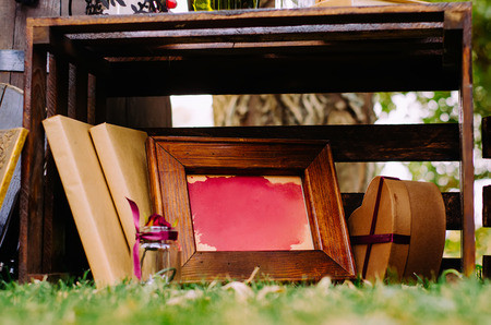 Beautiful decor with wine bottles, wooden boxes and other elements in nature.の写真素材