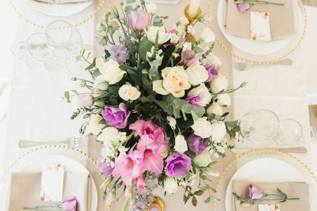Floral wedding decoration. Wedding table setting decorated with fresh flowers. Wedding floristry....
