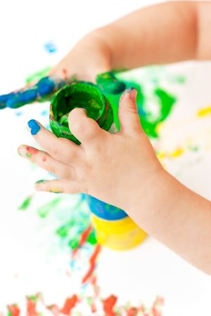 painted baby hands and paint bucketsの写真素材