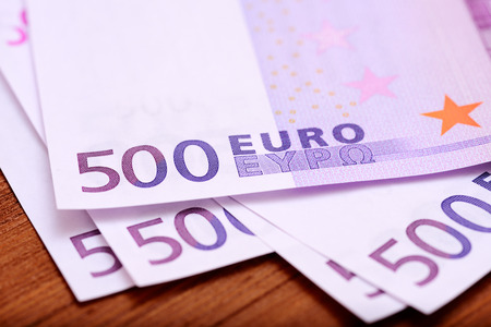 Europian currency euros banknotes on wooden tableの写真素材