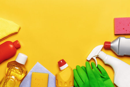 Set for cleaning various surfaces in the kitchen, bathroom and other areas. Empty place for text on...