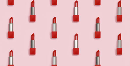 Seamless geometric pattern of red lipstick on a pink background.の写真素材