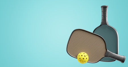 Pickleball rackets and a sports ball on a blue green background. 3d renderingの写真素材