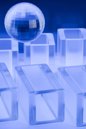 A glass sphere above transparent rectangular blocks on a blue background. 3d renderingの写真素材
