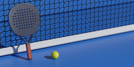 A padel racket and ball are positioned on a blue court next to a net. 3d renderingの写真素材