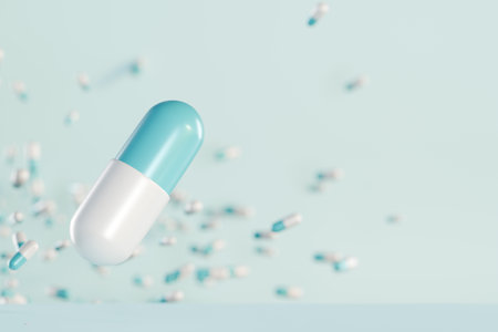 A blue and white capsule pill floats above scattered tablets on light background. 3d renderingの写真素材