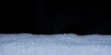 freshly fallen snow lies on a horizontal surfaceの写真素材