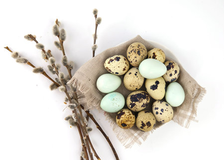 Easter background, colorful Easter eggs and decorations on a light background. top view