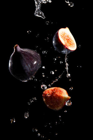 Ripe beautiful ginger, slices and whole berriesの写真素材