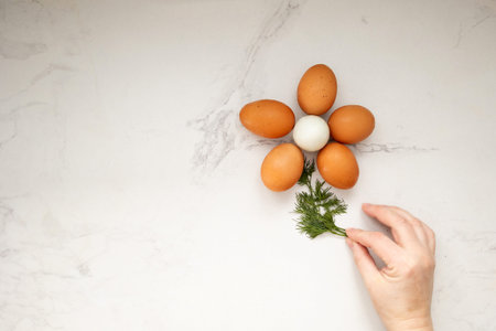 An artistic display of beautifully arranged eggs resembling a flower, perfect for celebrating spring...