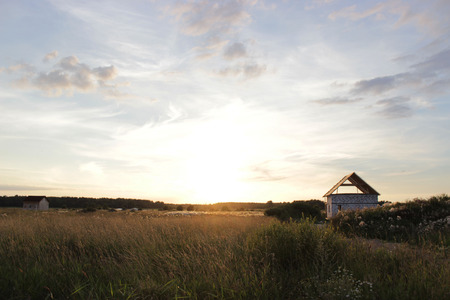 Russian village at sunsetの写真素材