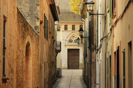 Narrow street in Alcudia, Mallorca, Spainの写真素材